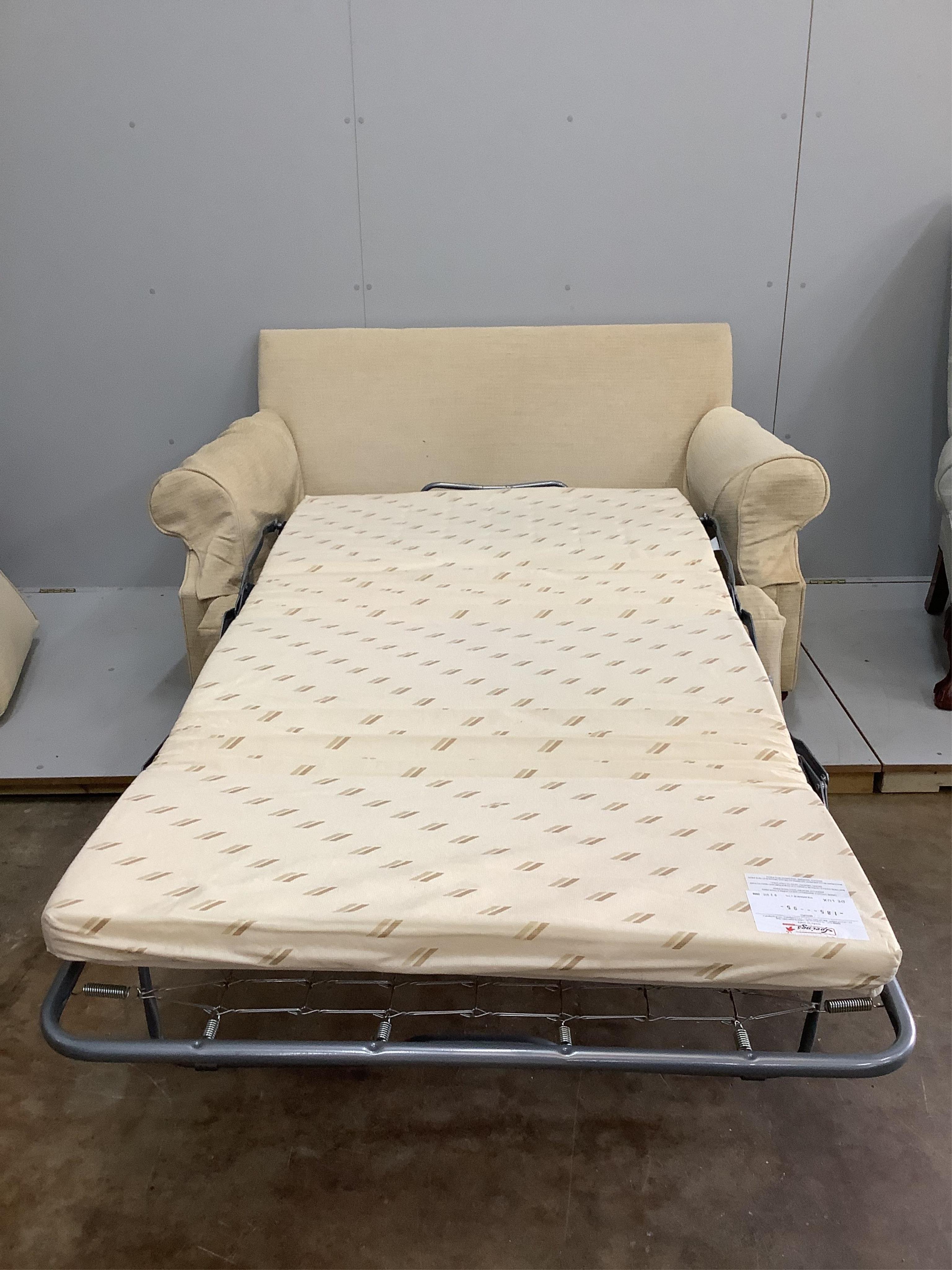 A modern two seater sofa bed, width 150cm, depth 90cm, height 80cm. Condition - good